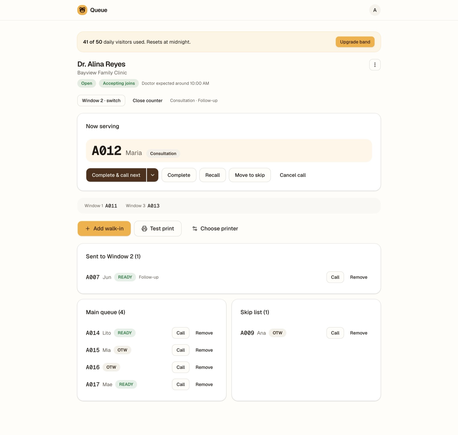 The staff counter screen: Now serving A012, buttons for complete, recall, move to skip, the main queue list and a skip list.